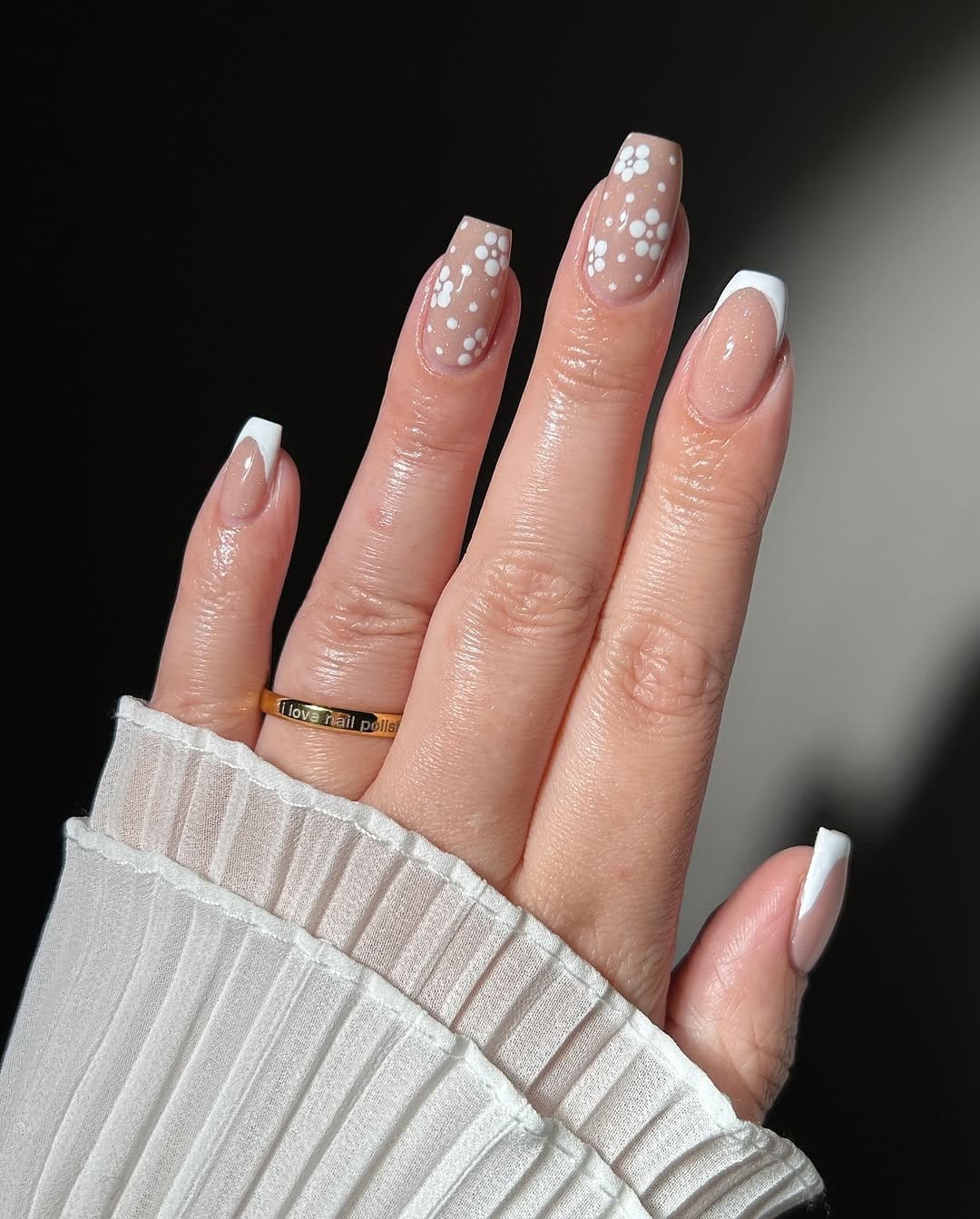 White nails with lace and glitter combo