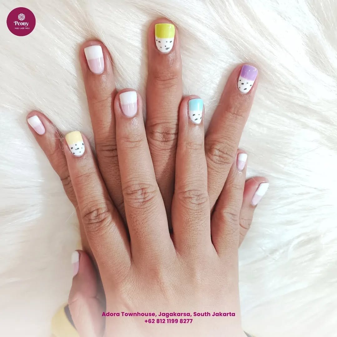 Pastel splatter art nails with vibrant colors