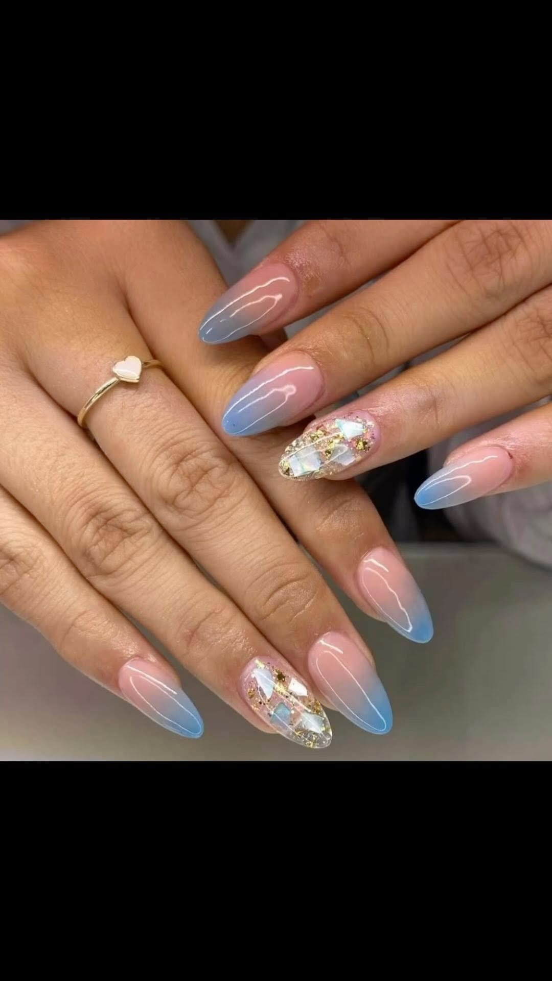 Sky blue ombre nails with a smooth gradient