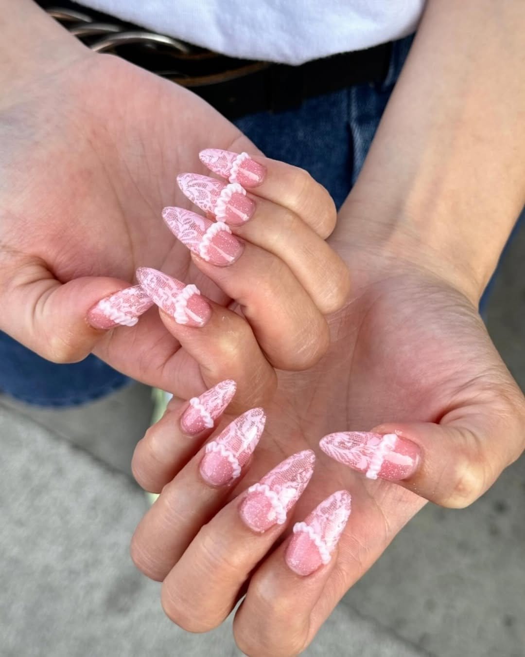 Delicate rose pink French tips with lace design