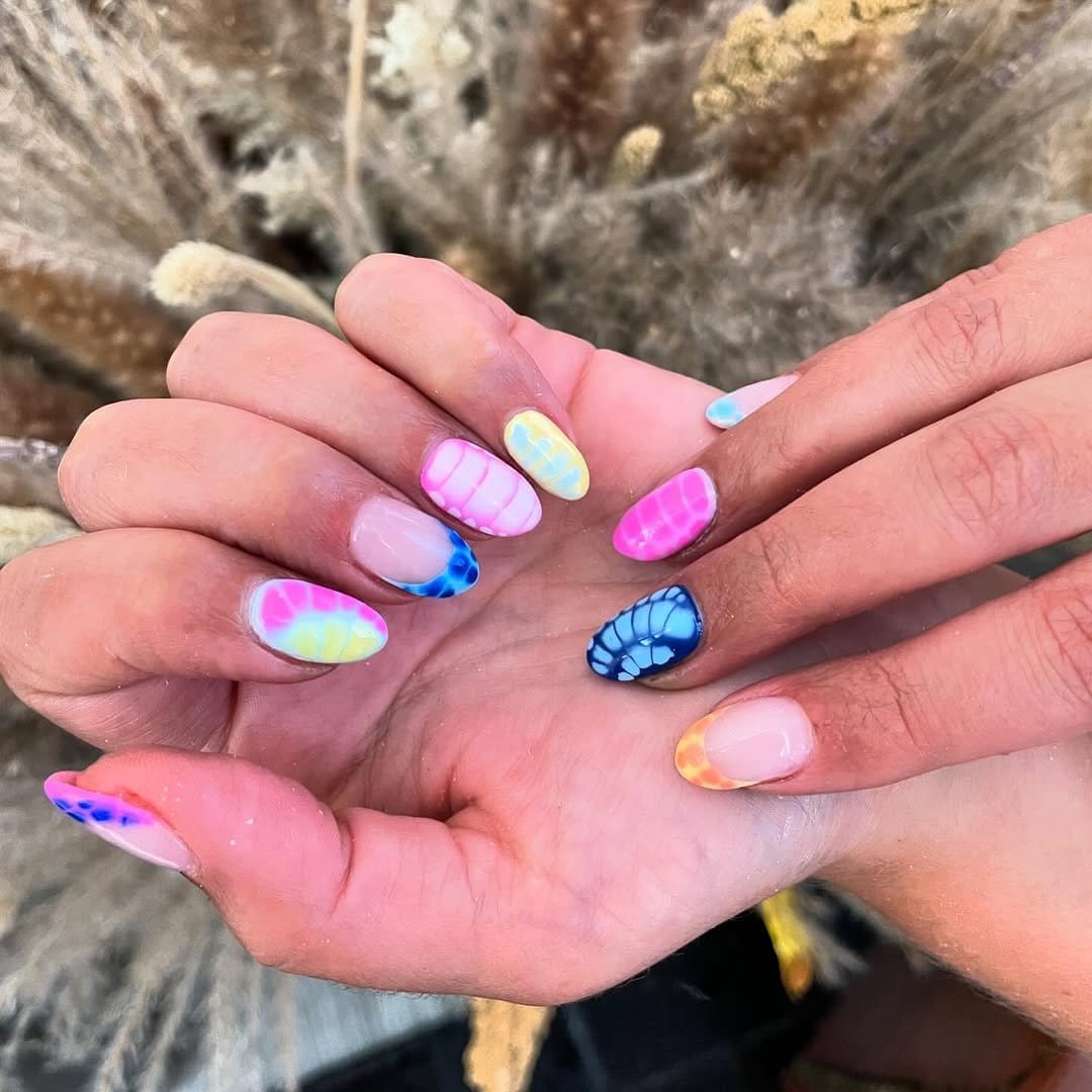 Vibrant pastel tie-dye nail art