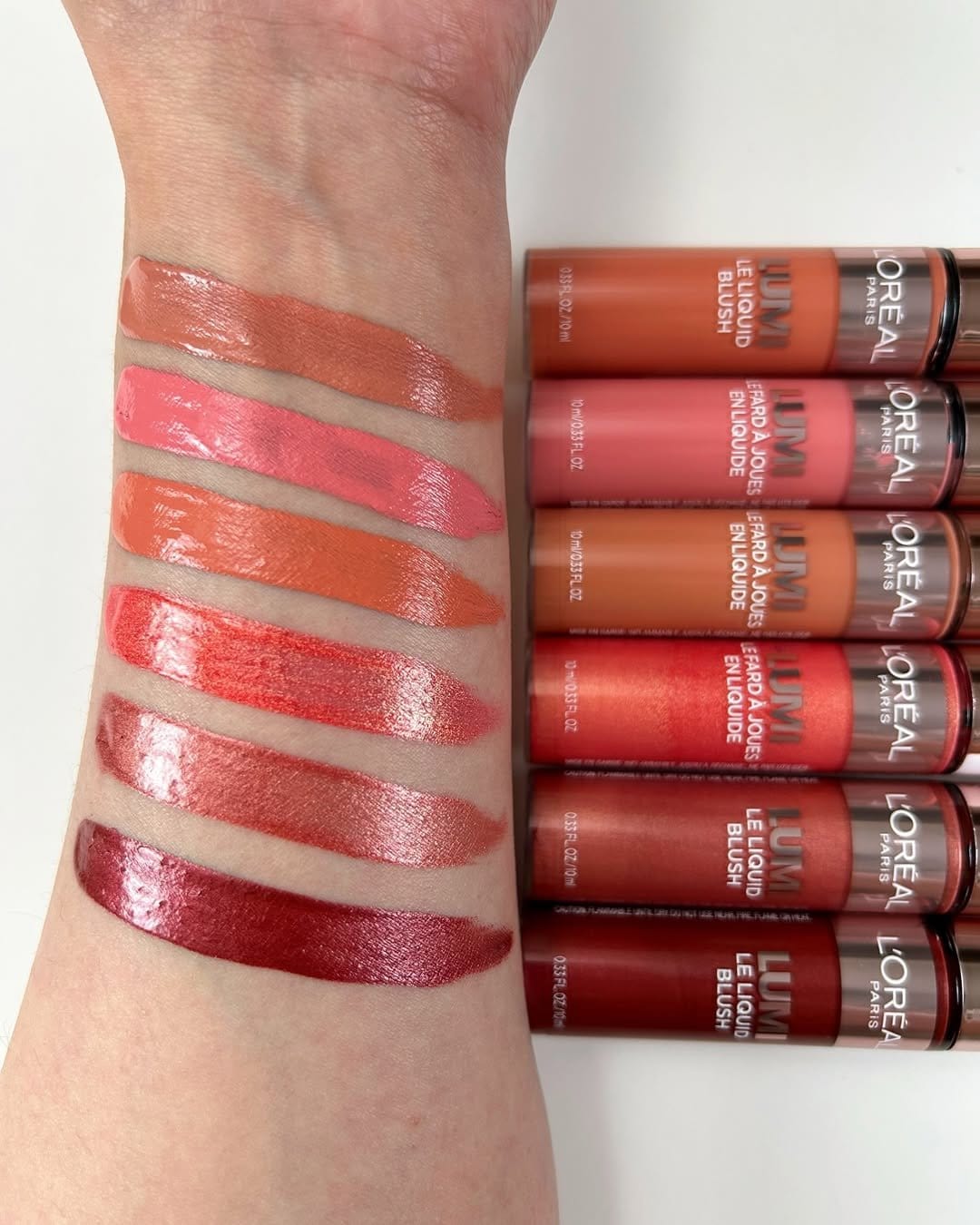 Bright coral lipstick and matching blush