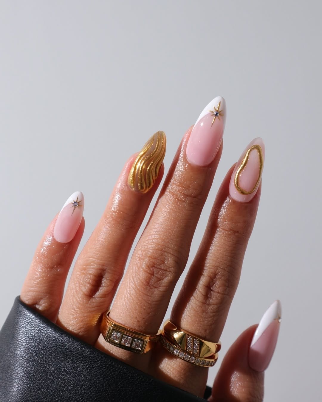 French tips with pastel star designs on clear base