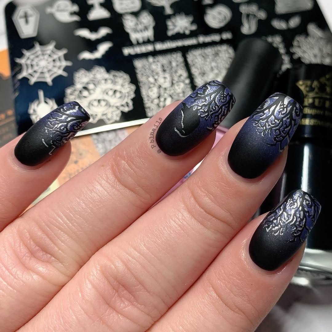 Light blue nails with bird silhouettes
