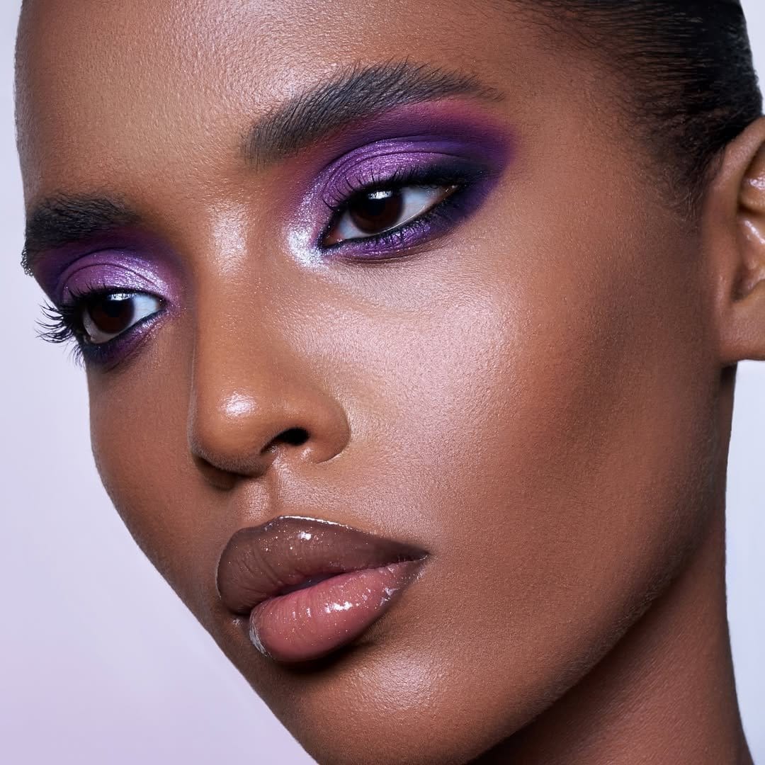Violet eyeshadow with luminous skin