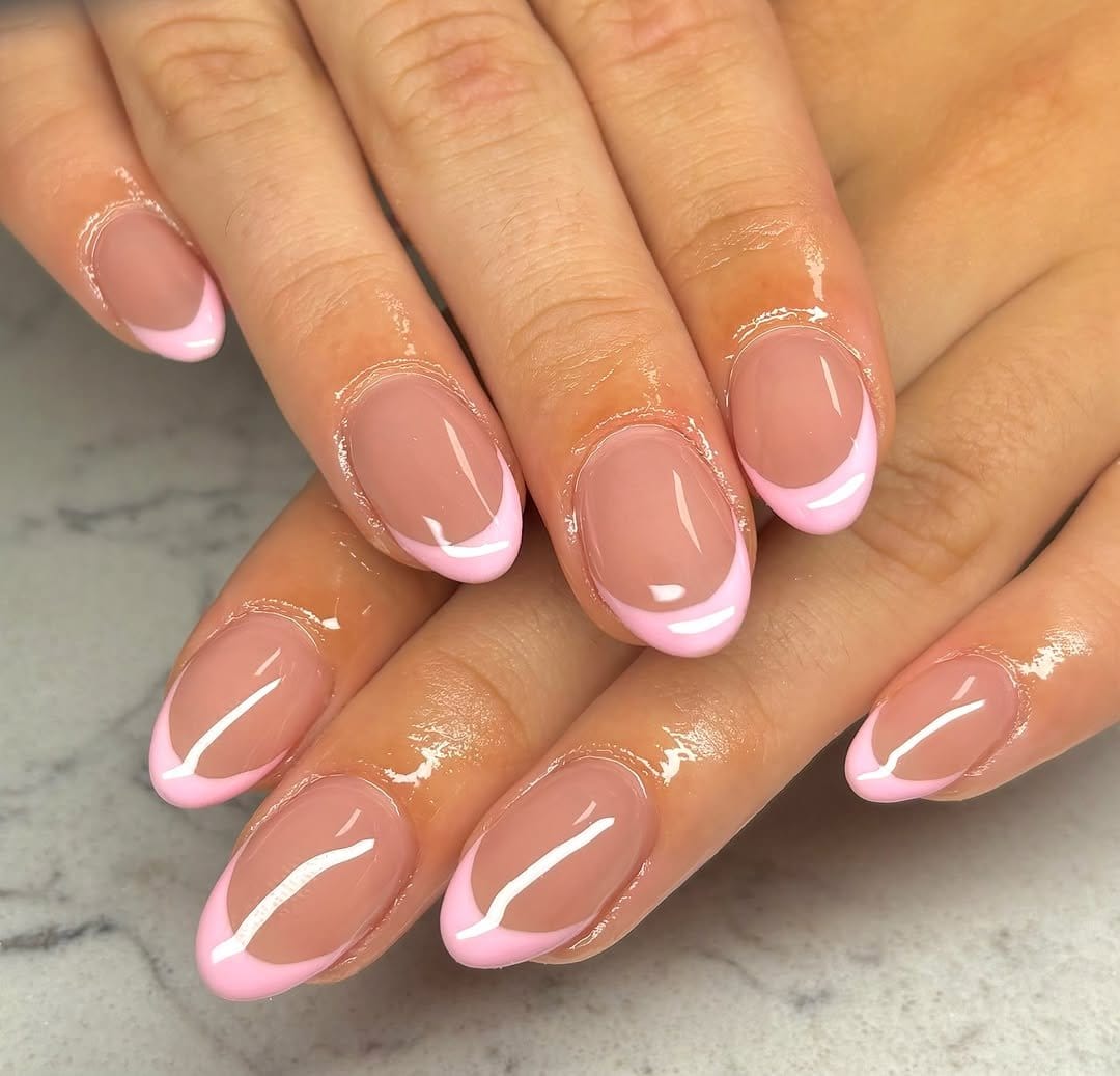 Delicate pastel pink French tips manicure