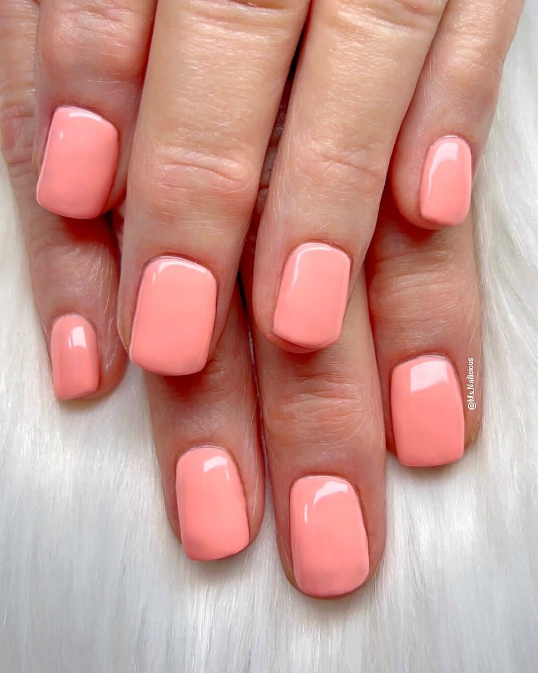 Pale coral nails with gold leaf