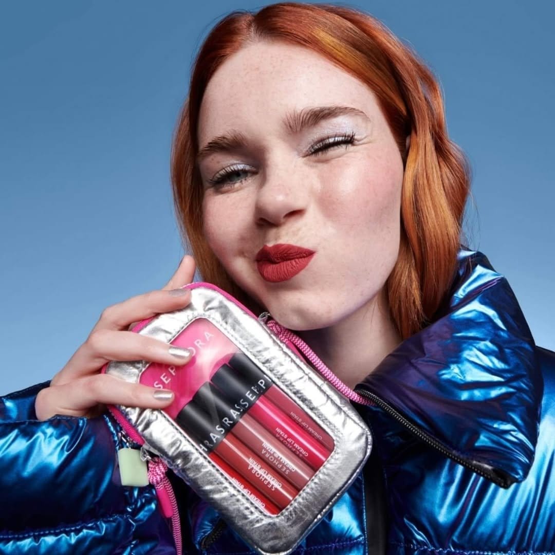 Neon pink lipstick with colorful lights