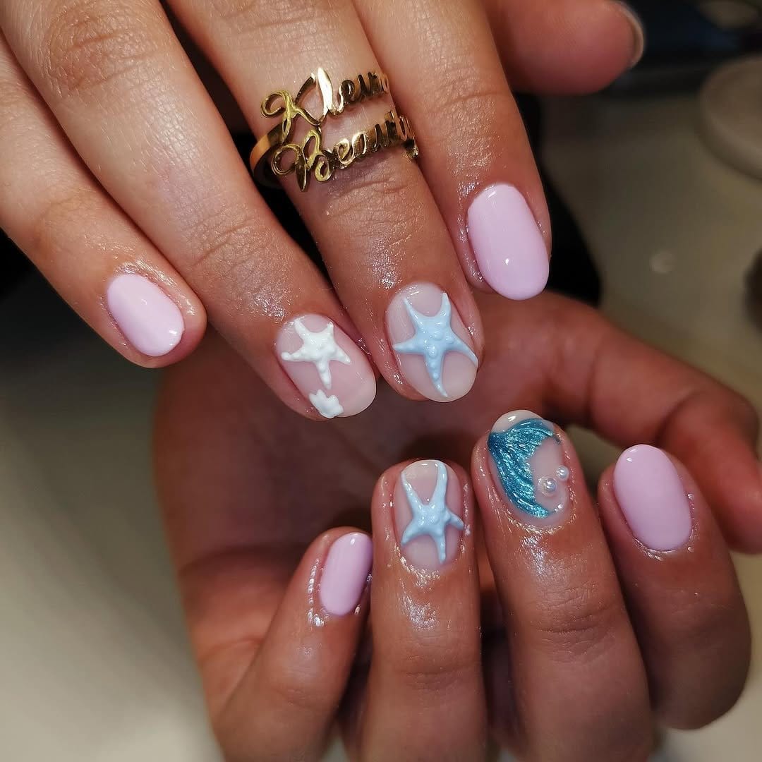 Rich jewel-toned nails with a glossy finish