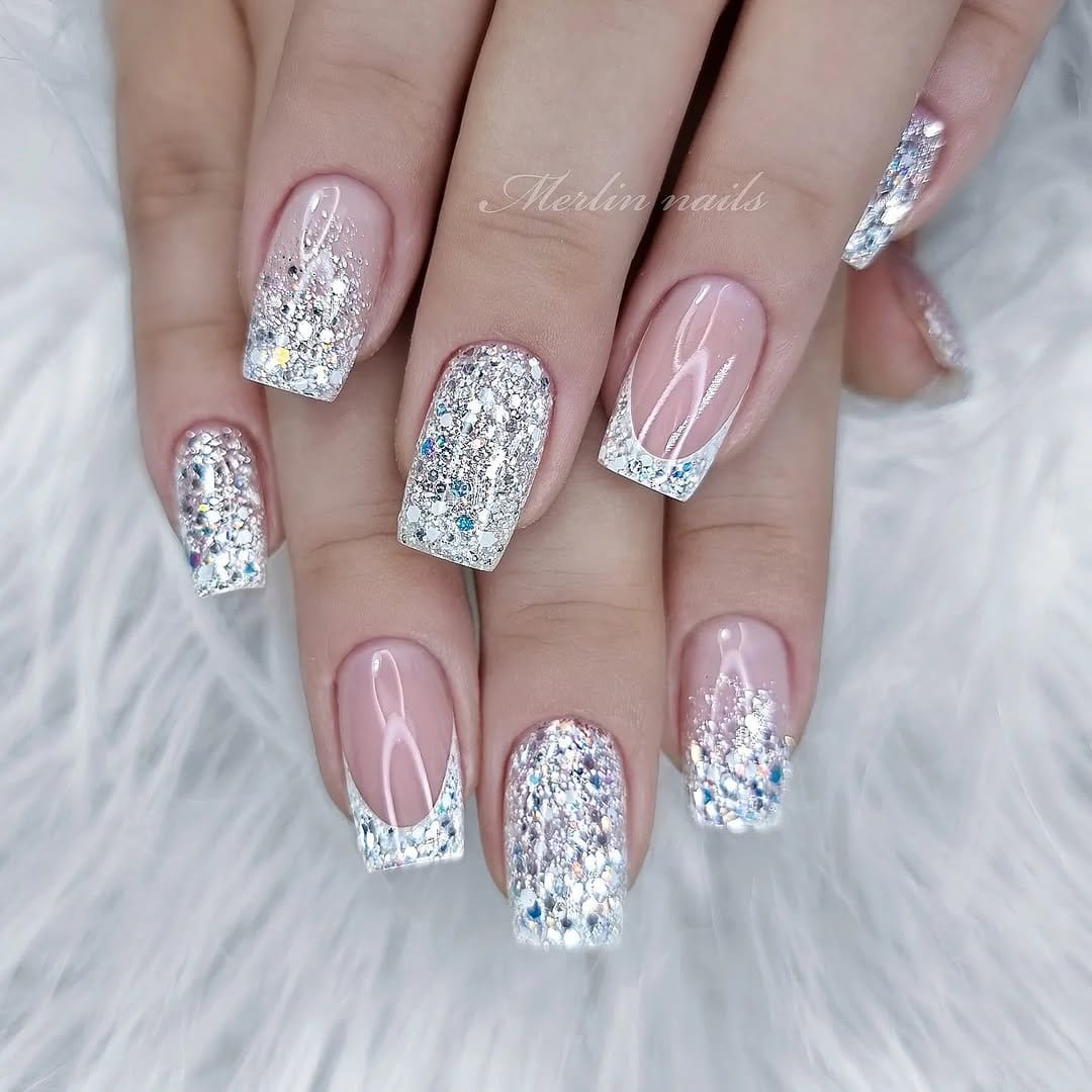 Sparkling glitter-tipped nails with a clear base