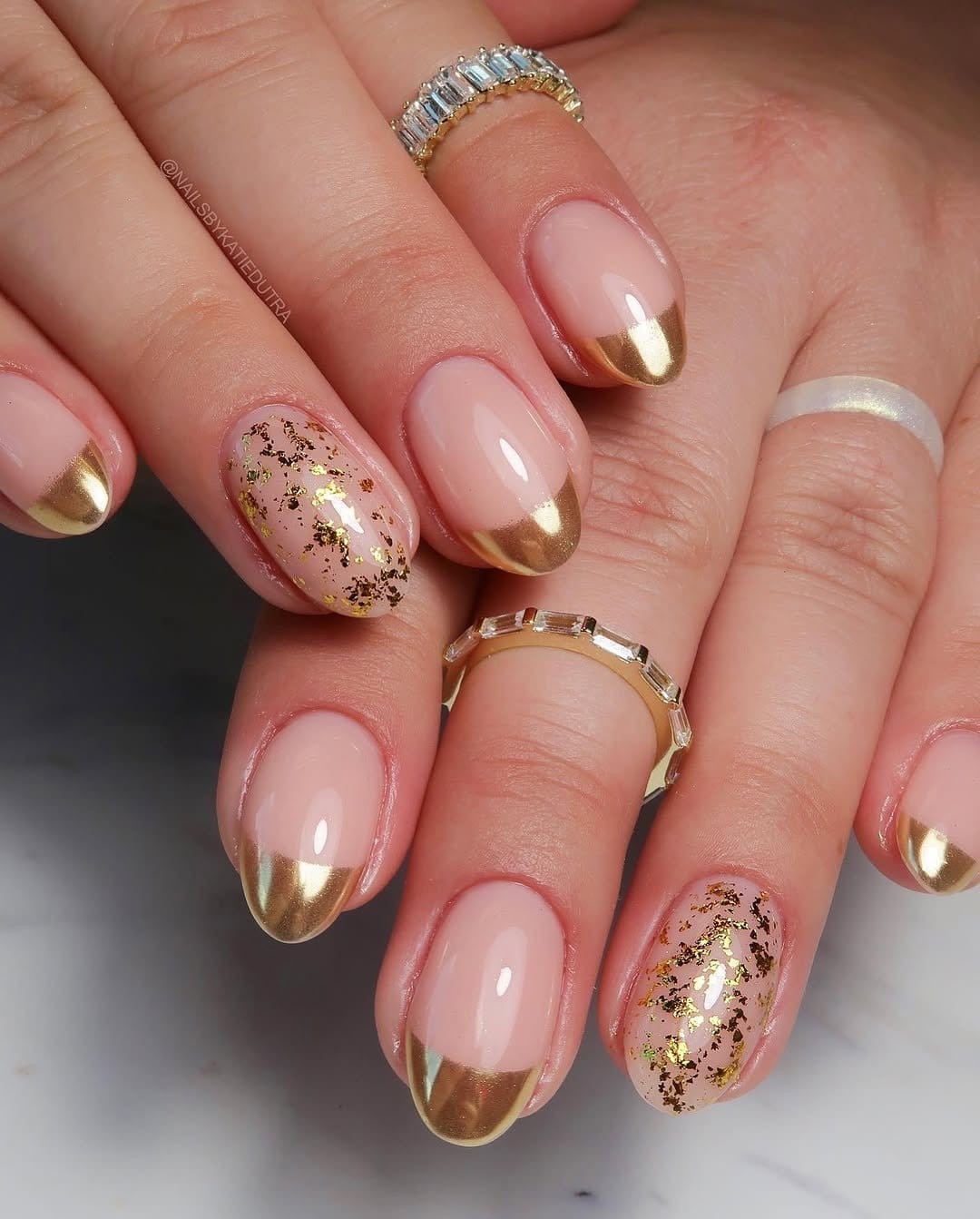 Coral French tips with gold foil accents