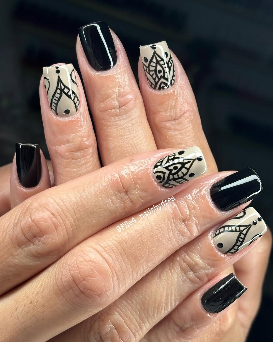 Mandala-inspired white floral nail art