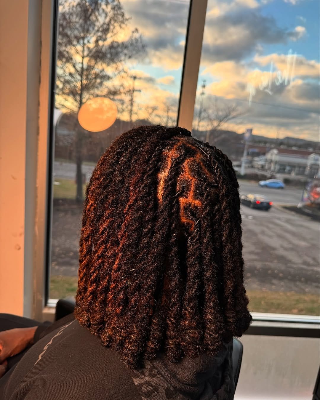 Modern asymmetrical dread hairstyle