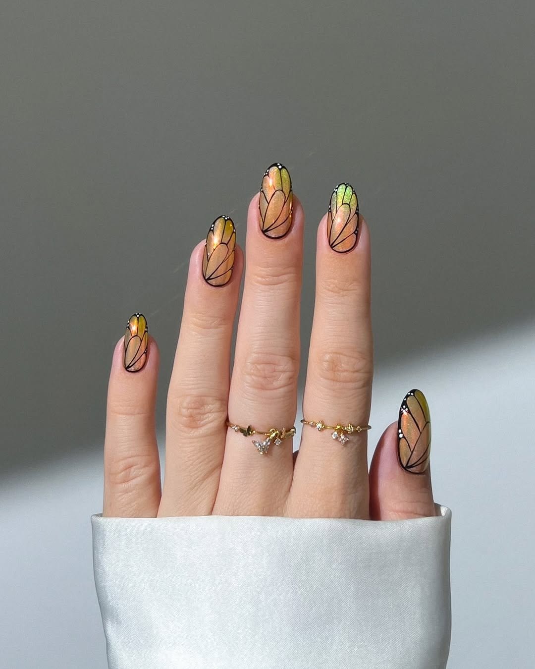 Colorful butterfly wing-inspired nails