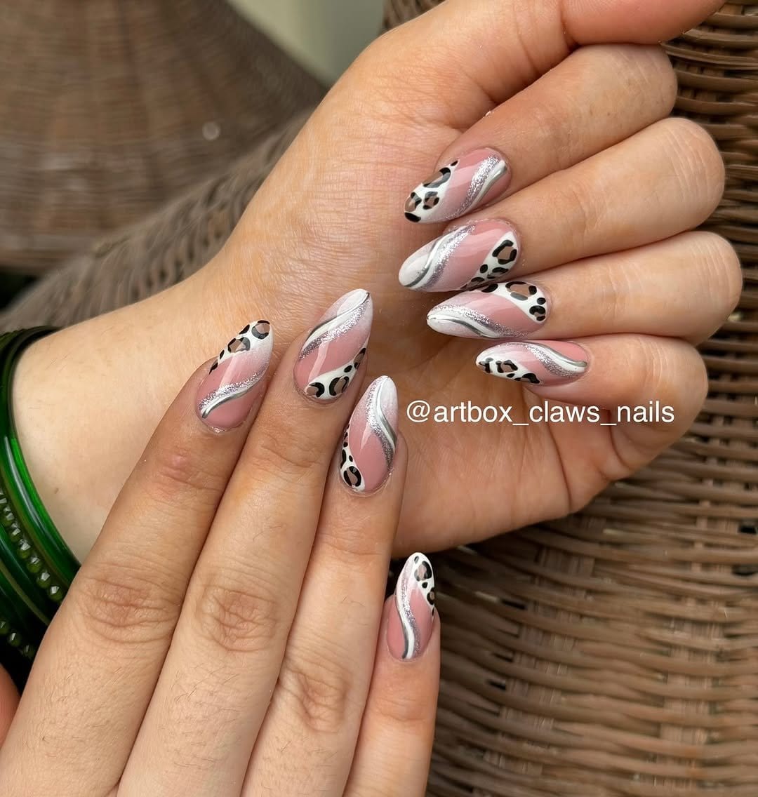 White nails with subtle leopard print design