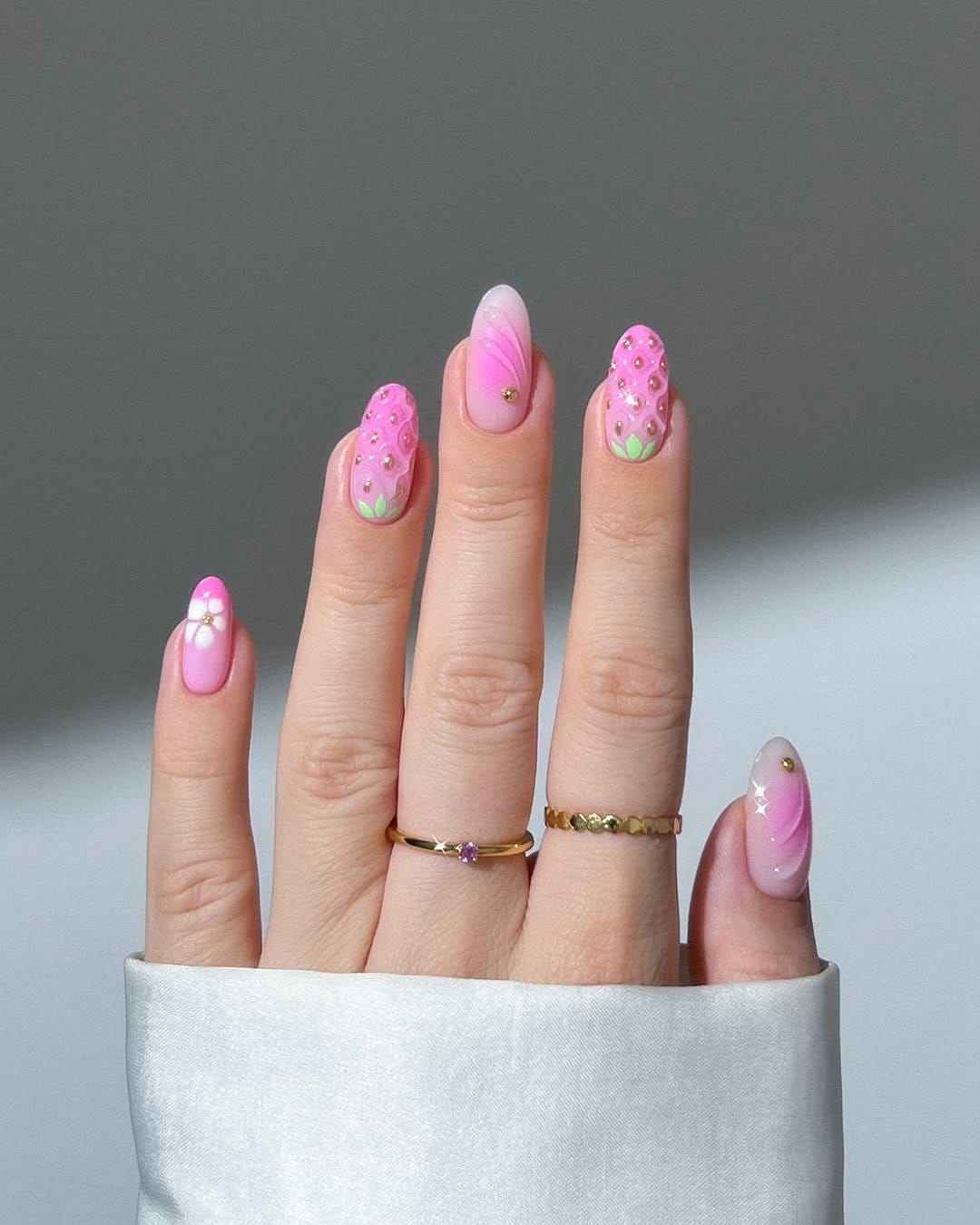 Pastel pink nails with bubblegum designs
