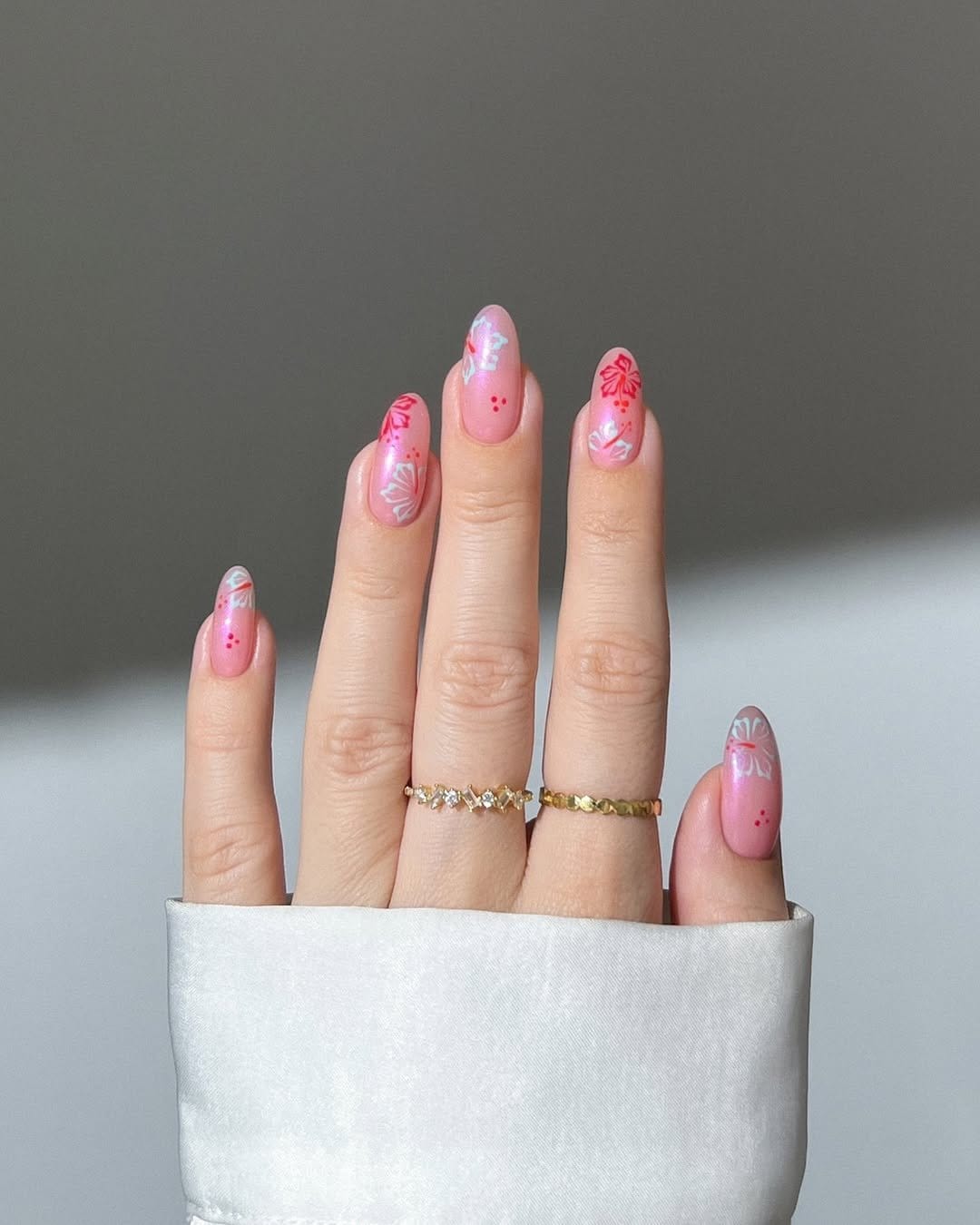 Delicate pastel peach ombre nails with blossoms