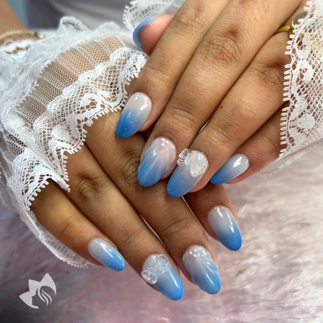 Pink ombre nails with lace patterns
