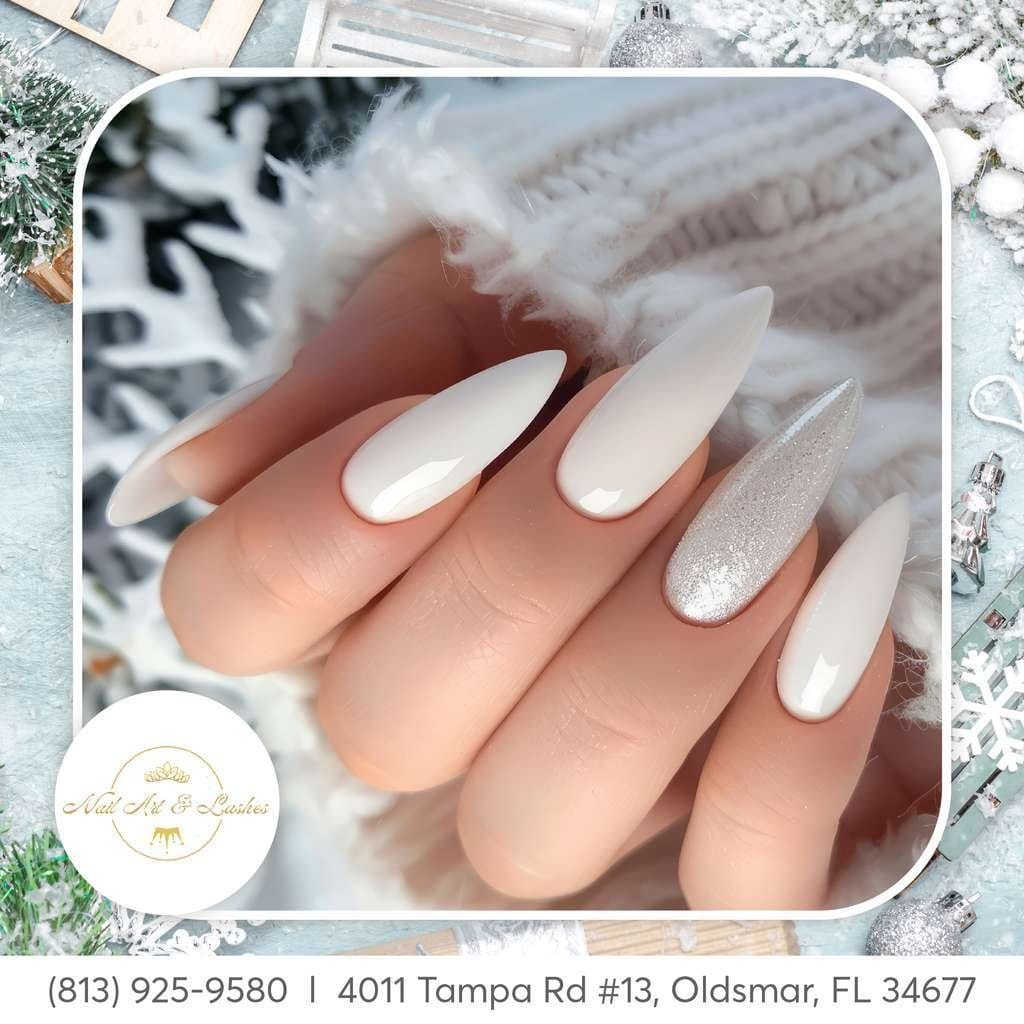 White nails with silver glitter accent