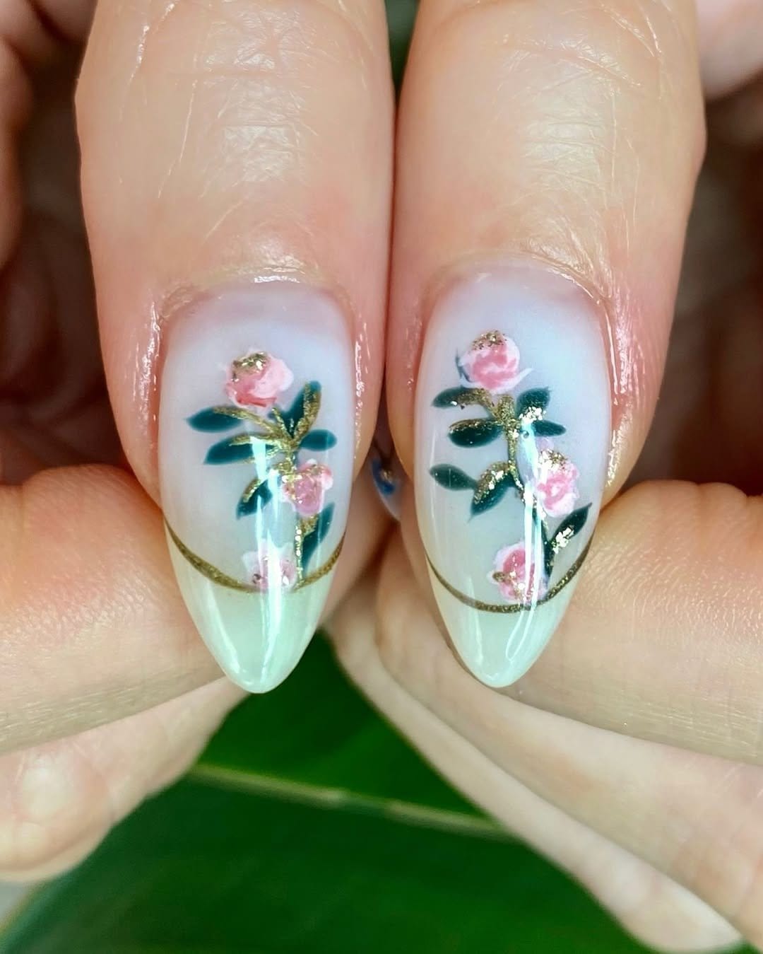 White floral nail stickers on colorful nails