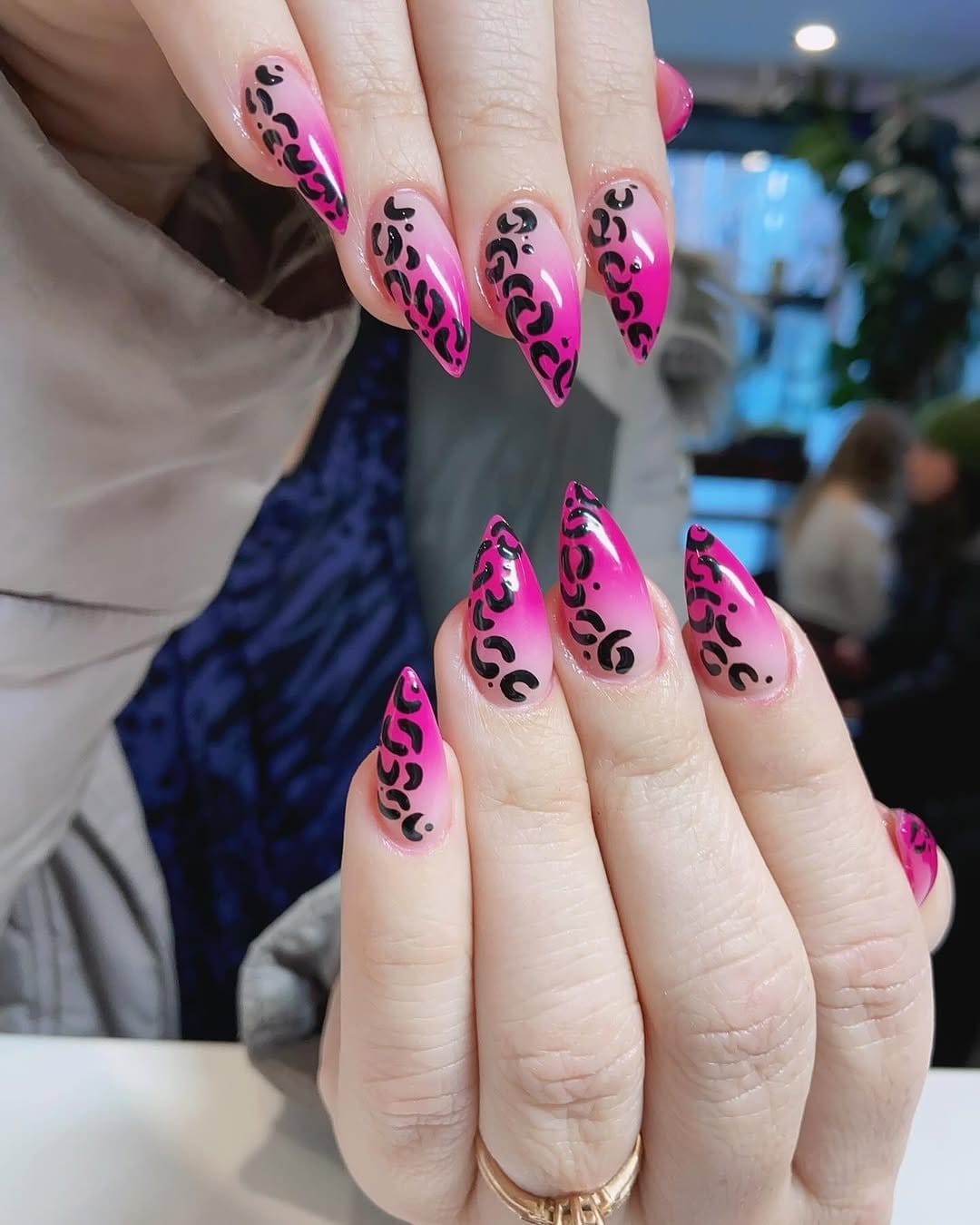 Pink ombre nails with leopard print