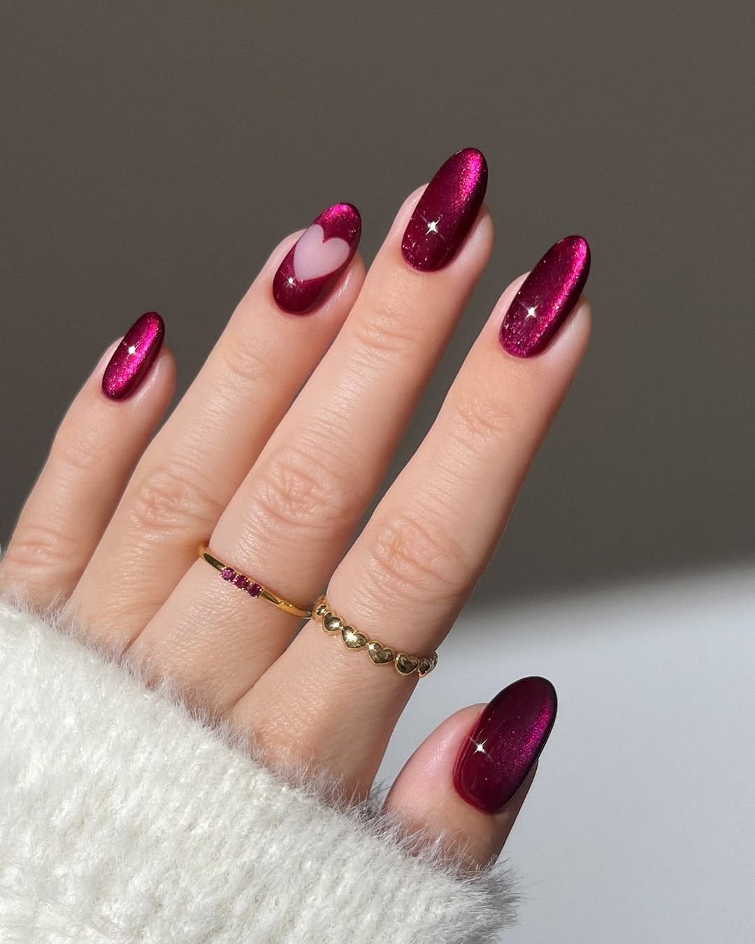 Elegant red and pink jeweled nails