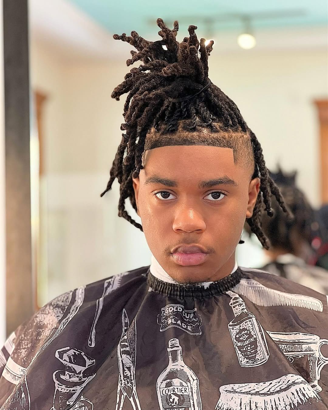 Tapered short dreadlocks with clean lines