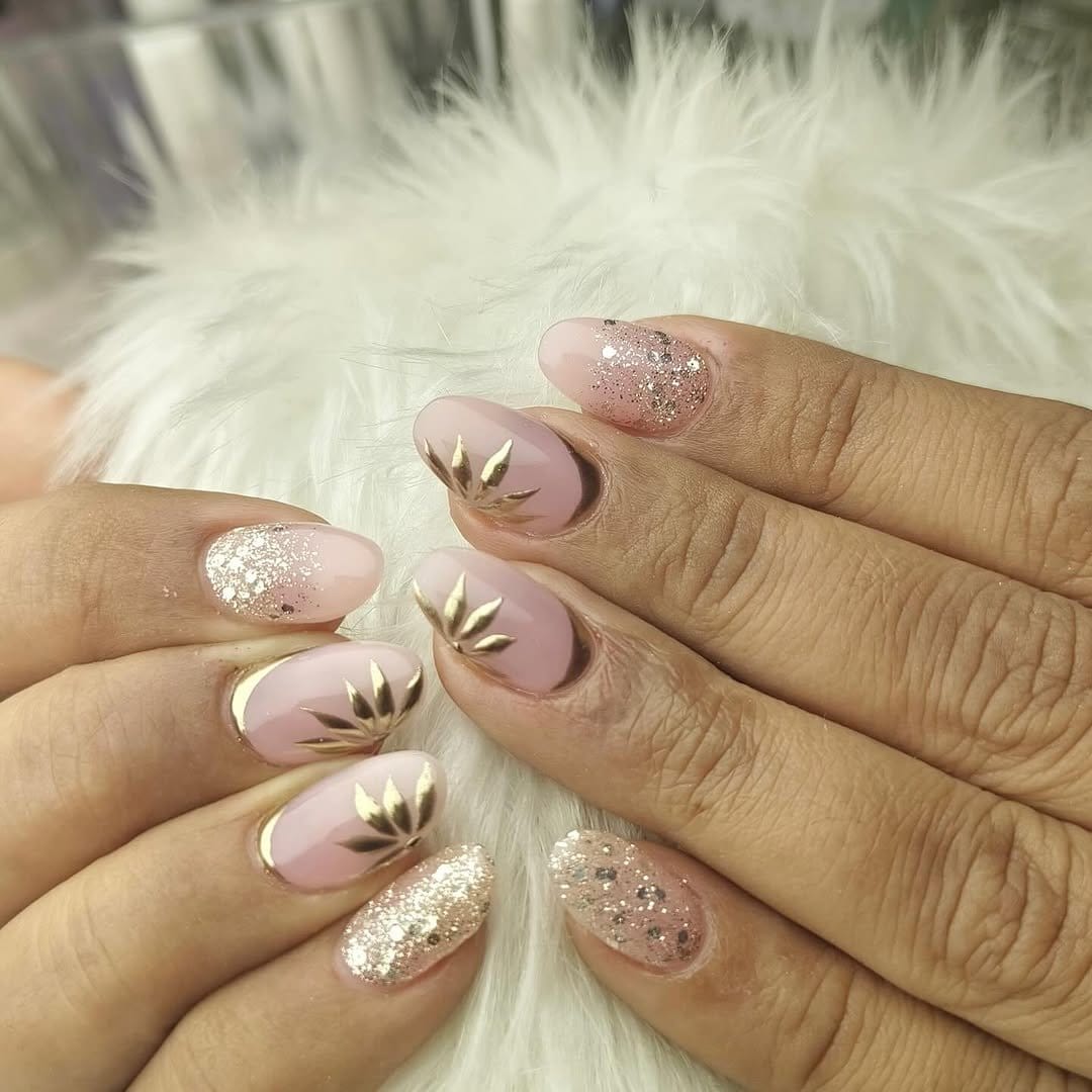 Pink ombre nails with gold foil accents