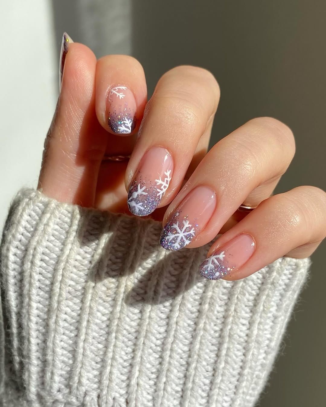 Icy pastel lavender ombre nails with frost backdrop