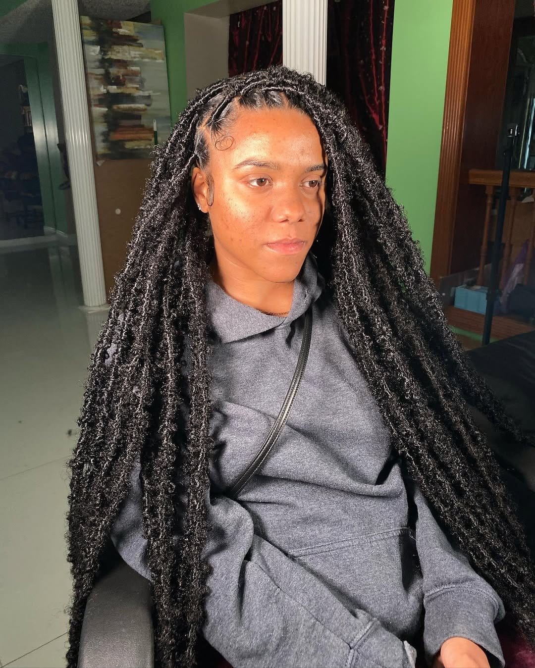Short dreadlocks wrapped with colorful threads
