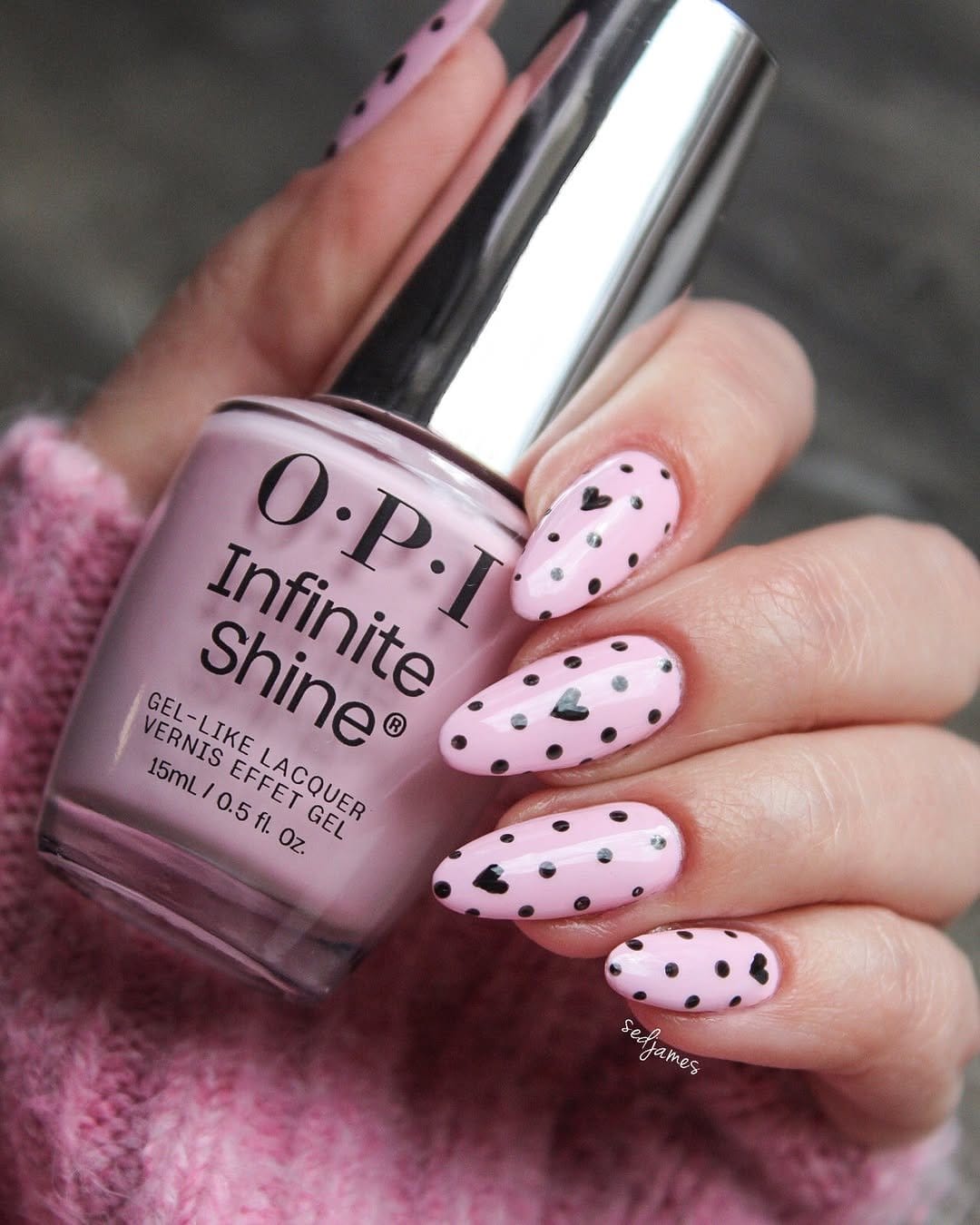 Nails with heart-shaped polka dots