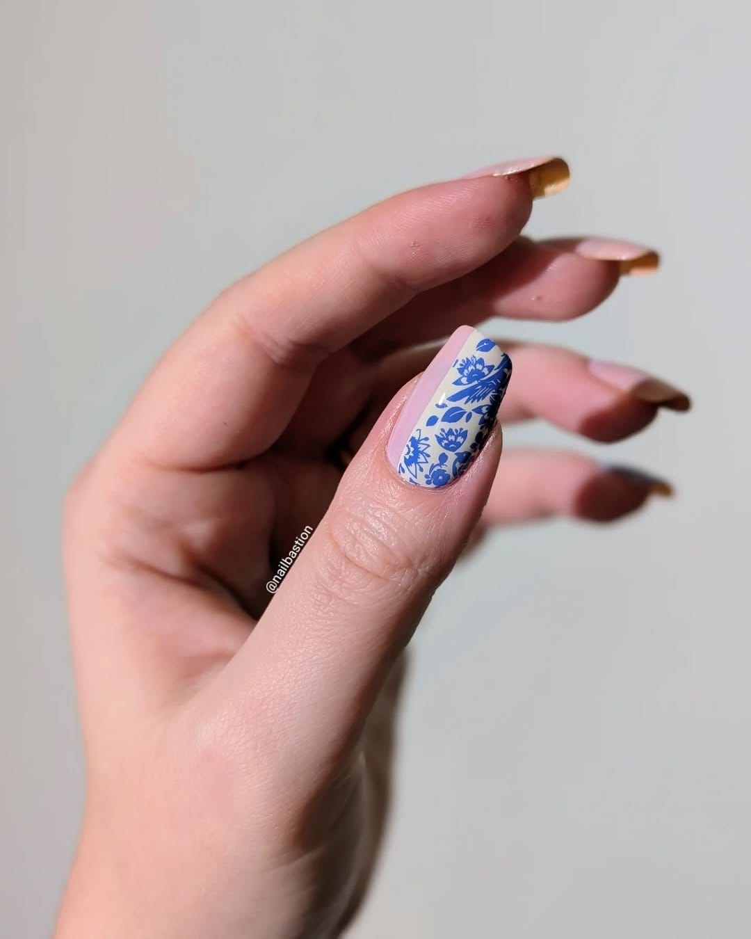 White nails with negative space glitter stripes