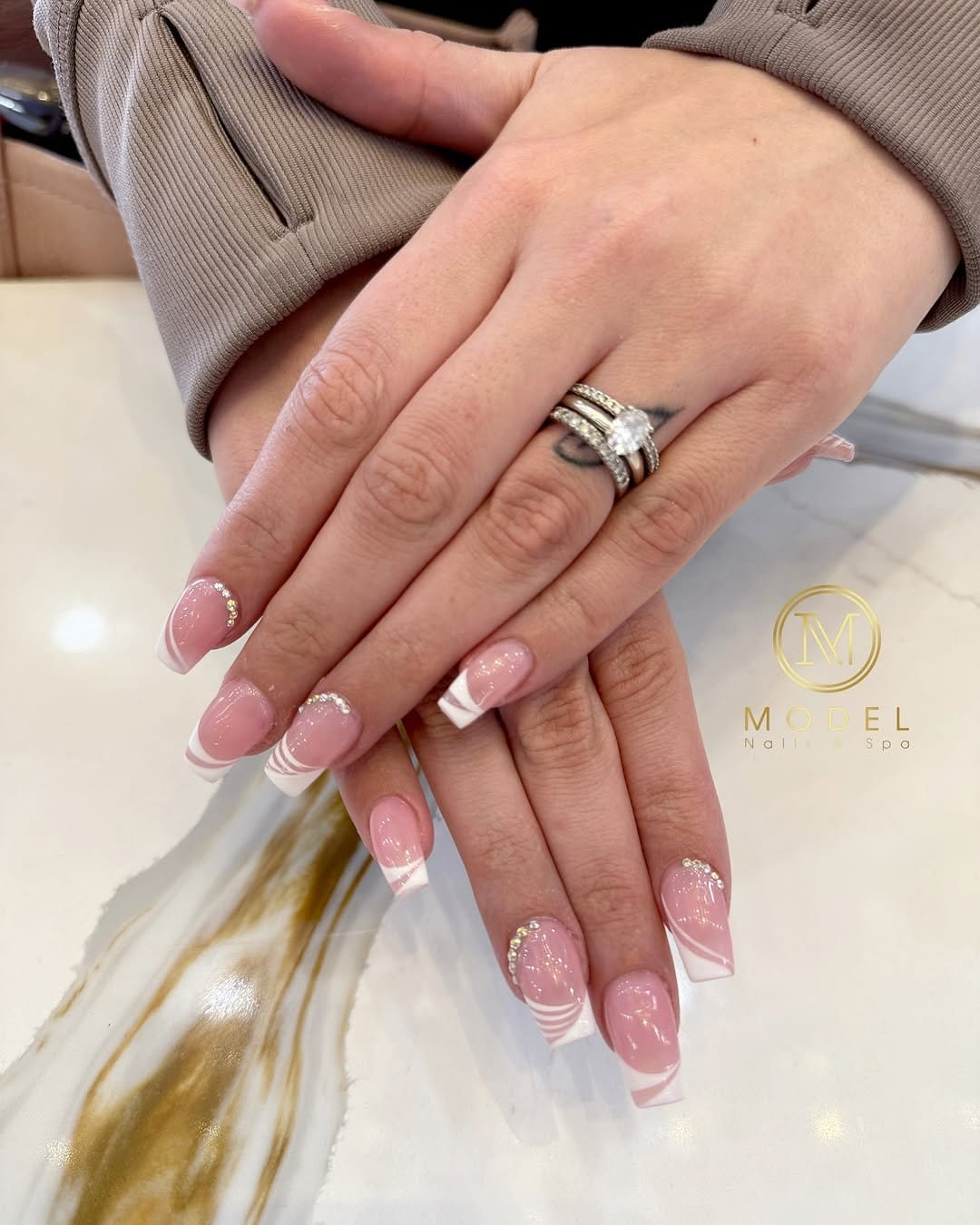 Elegant white French tip nails