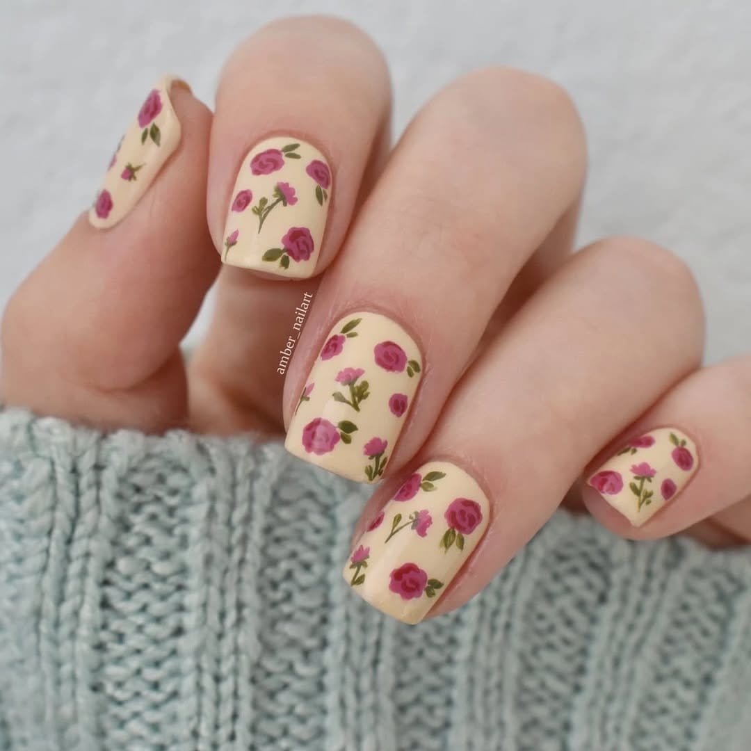 Pastel peach nails with ice cube designs