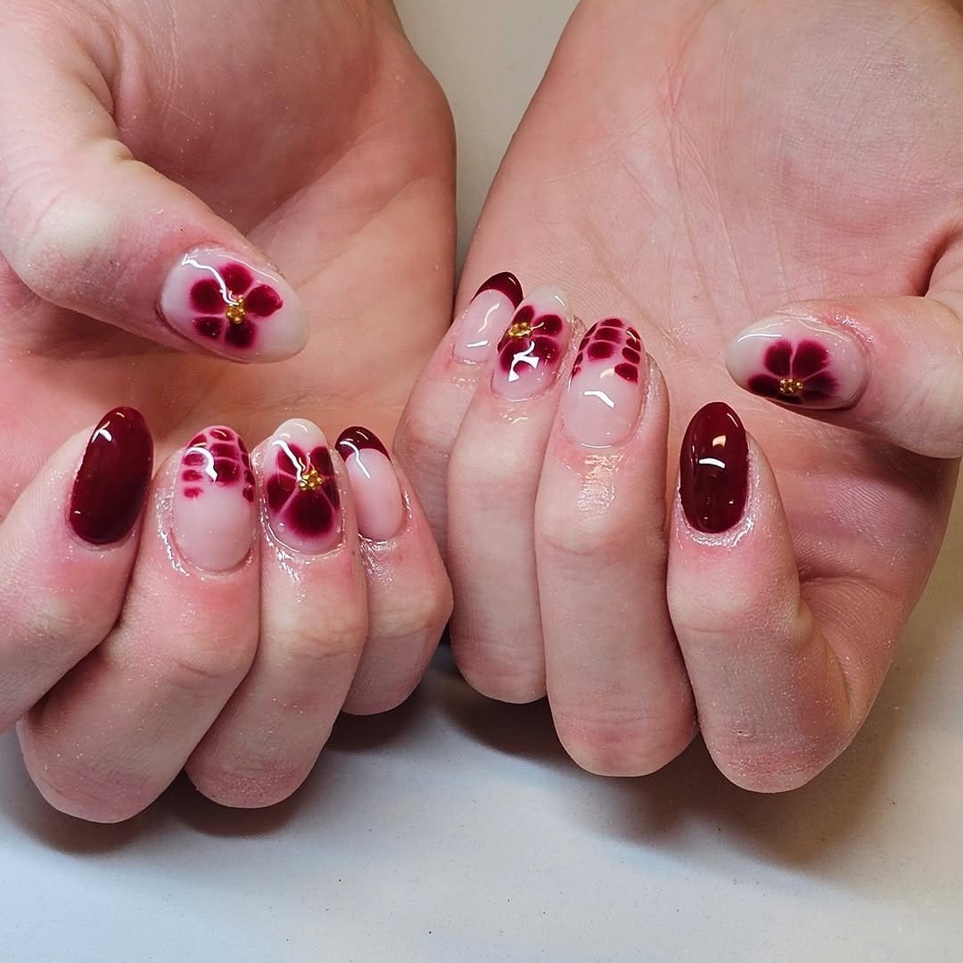 Exotic red bloom nail art
