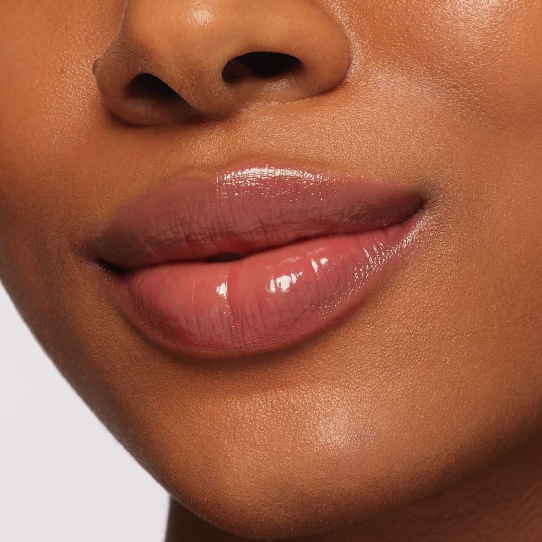Deep wine lipstick on marble background