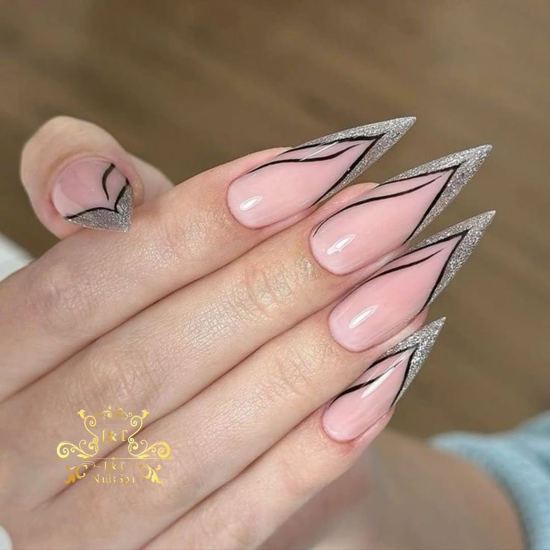 V-shaped red ombre nails with a sharp finish