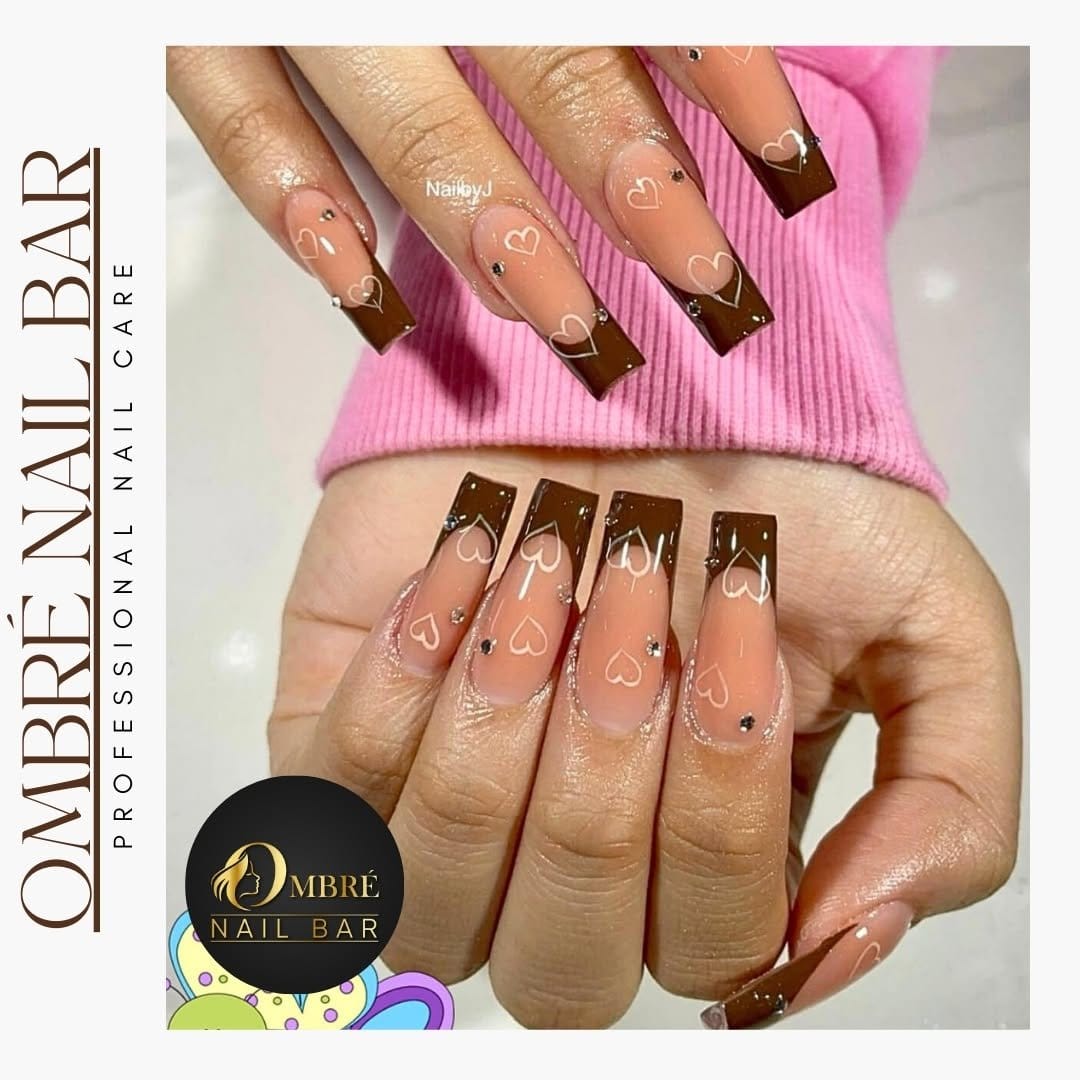 Pink ombre nails with geometric designs