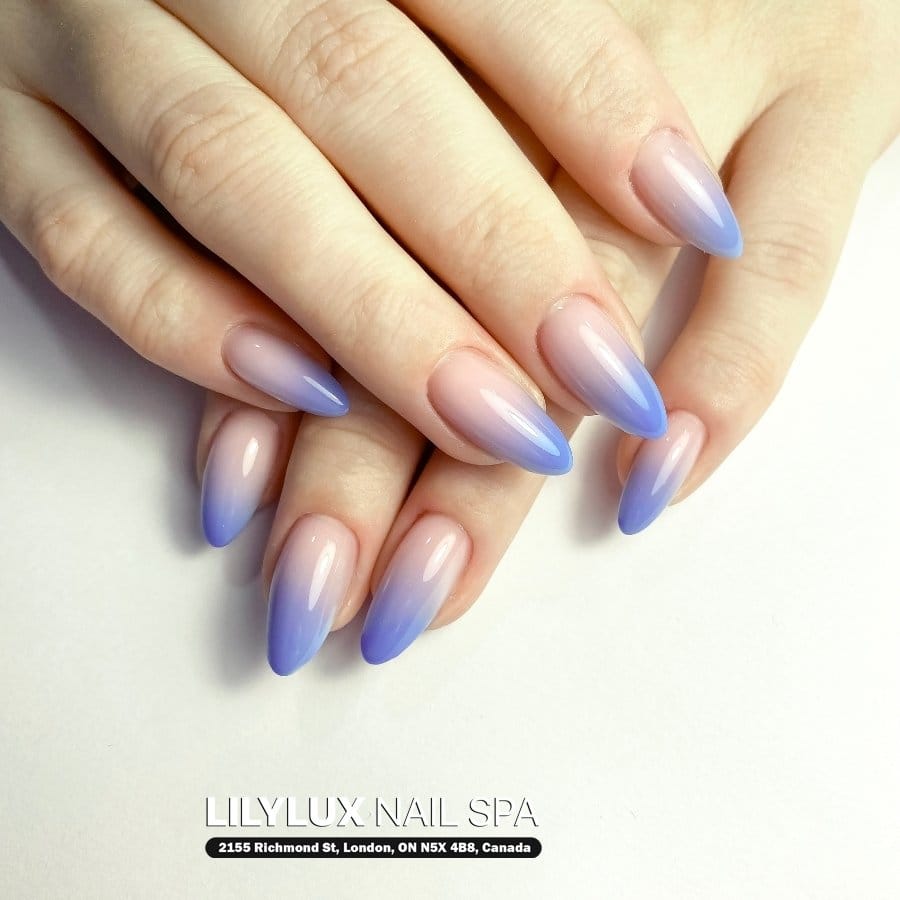 Pastel gradient dots on white nails