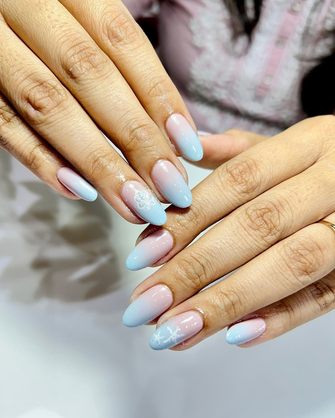Calming pastel blue ombre nails by the ocean