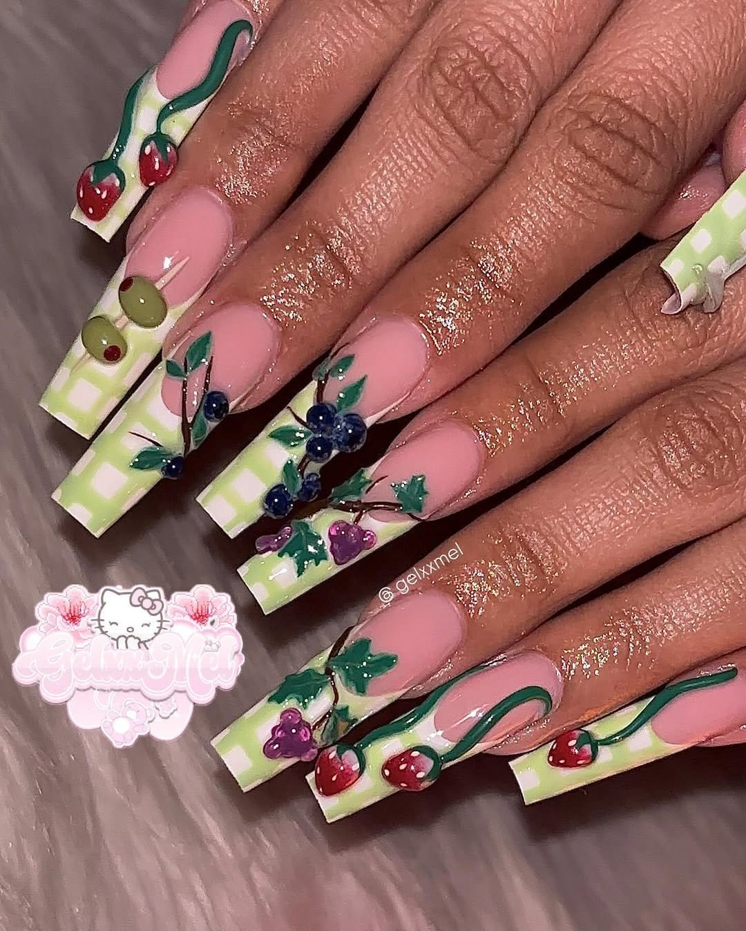 Pastel pistachio nails with geometric shapes