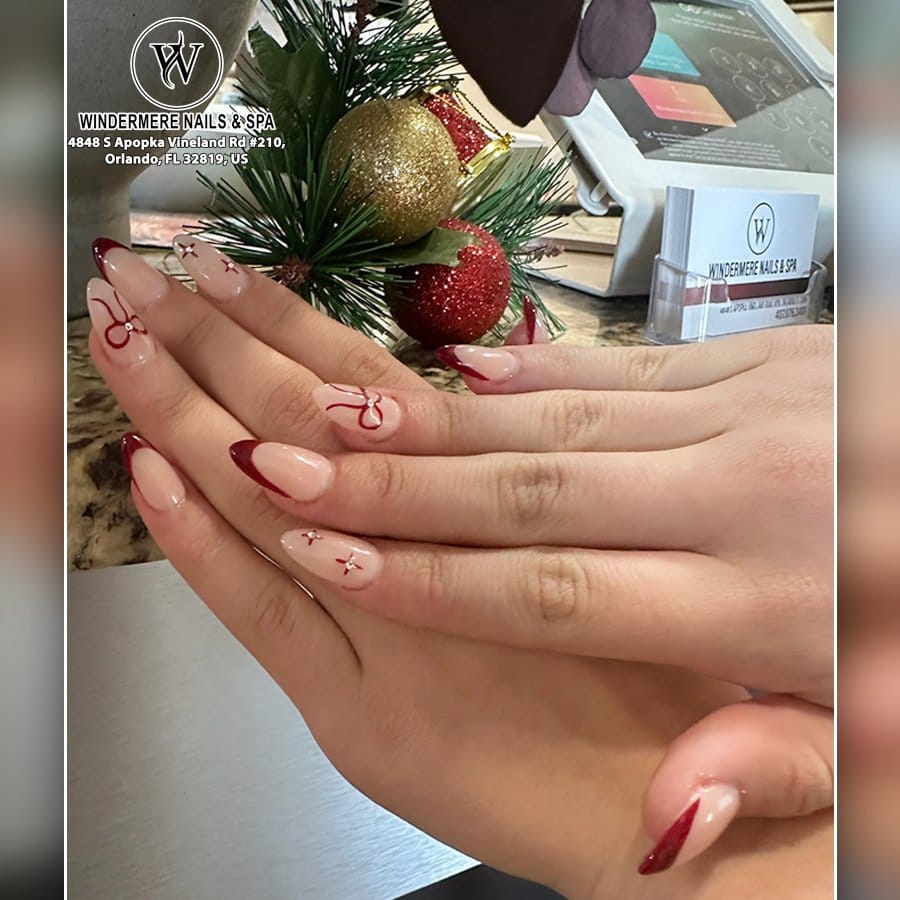 Pastel red nails with velvet texture