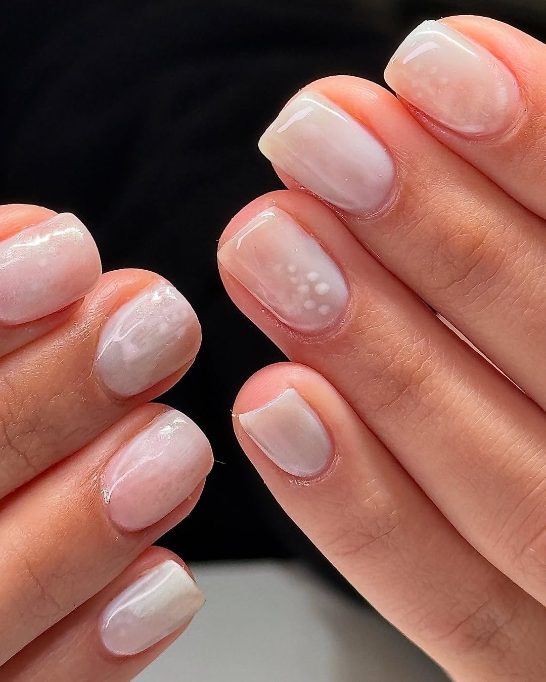 Artistic pink and red watercolor nails
