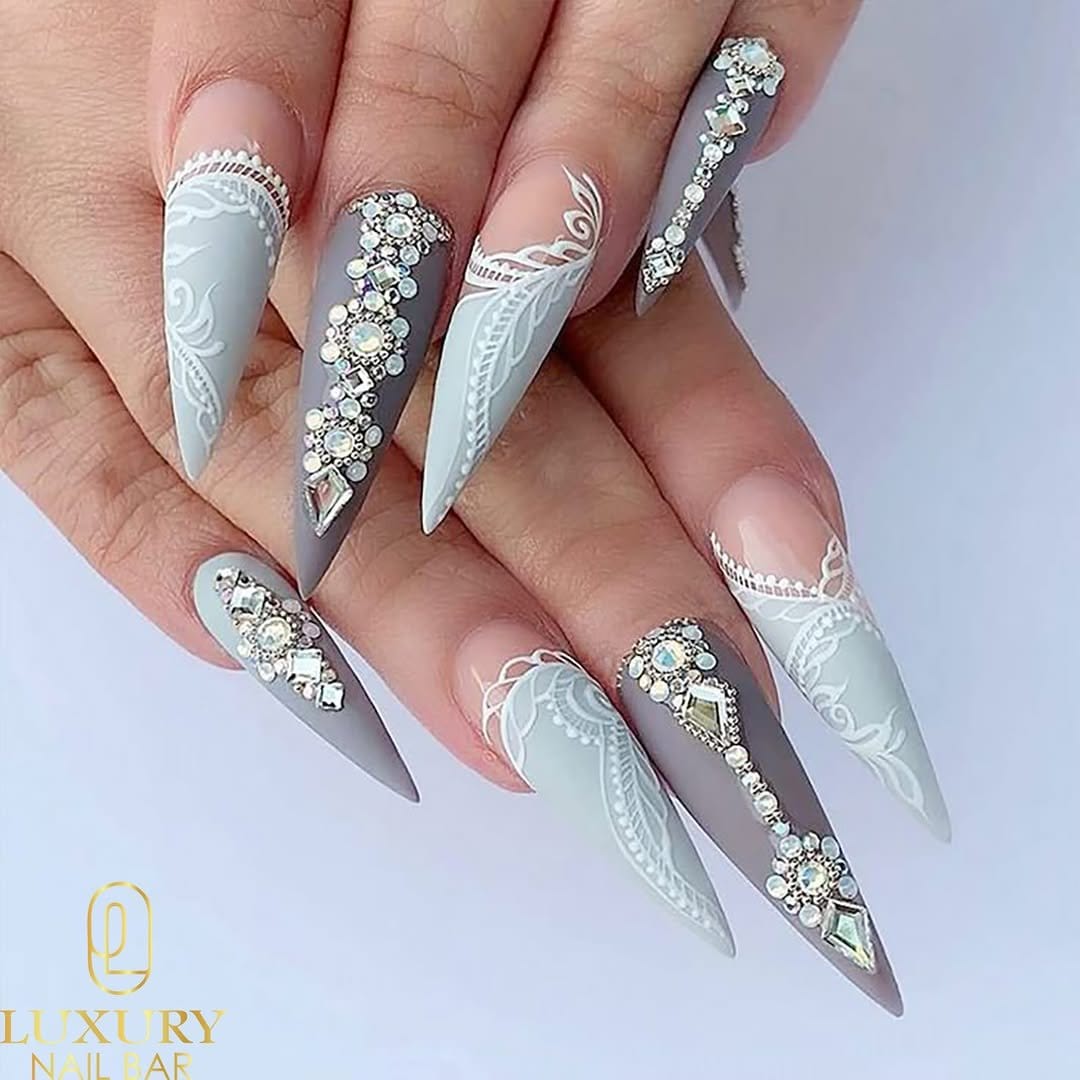 Luxurious white pastel crystal embellished nails