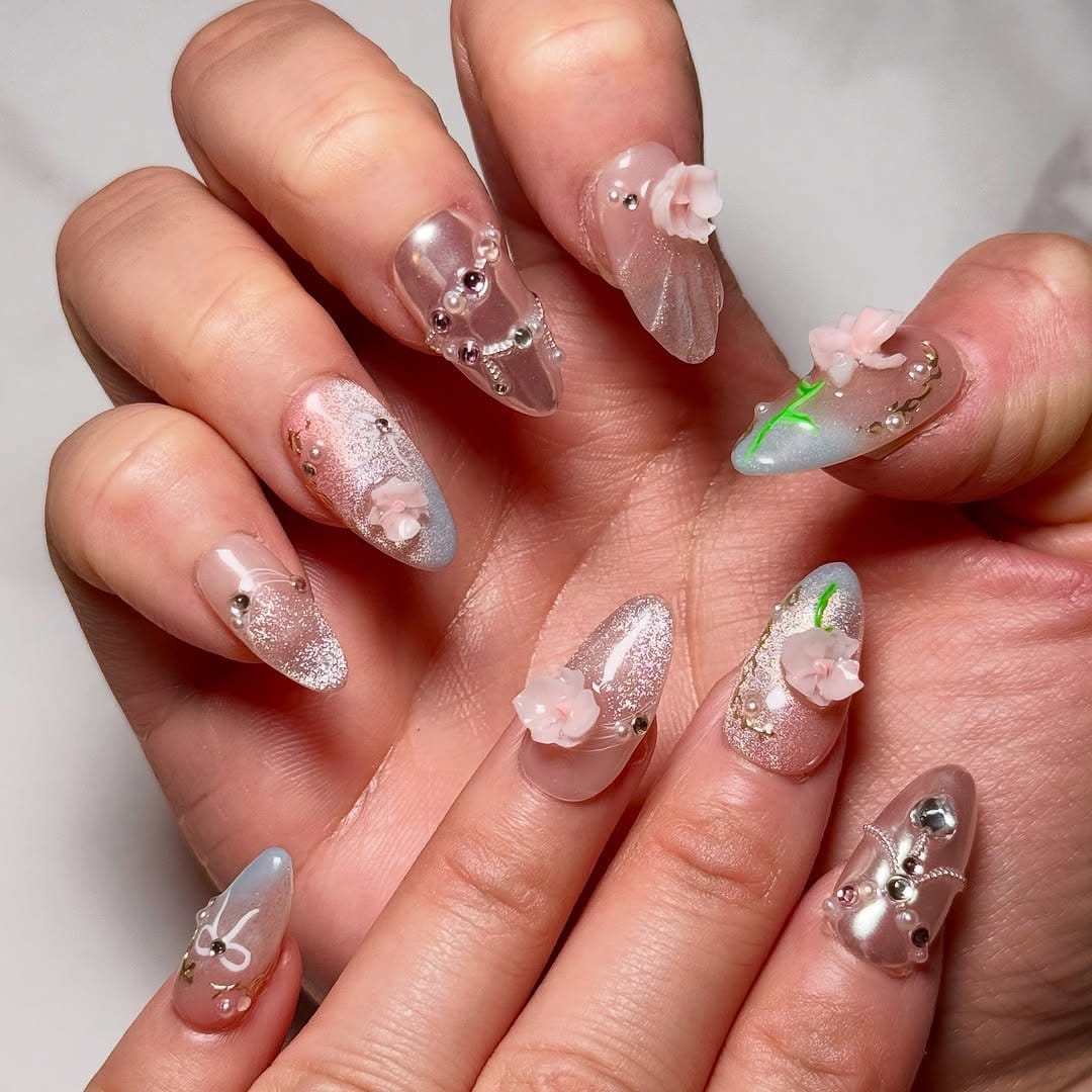 Glittery white petal nail art