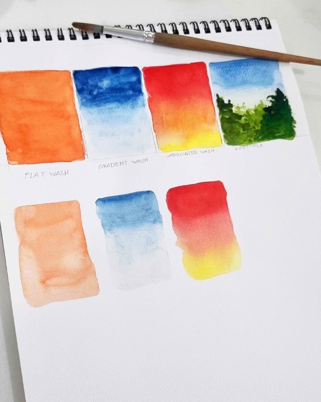 Soft watercolor-effect nails in pastel hues