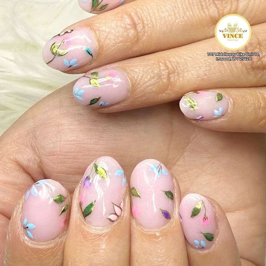 Floral garden nail art with pink base
