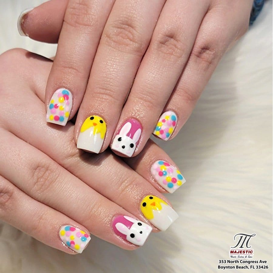 Rainbow-colored bunny nail art