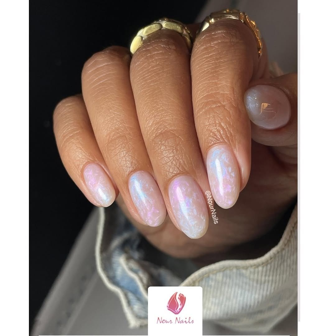 Pastel nails with metallic gold accents