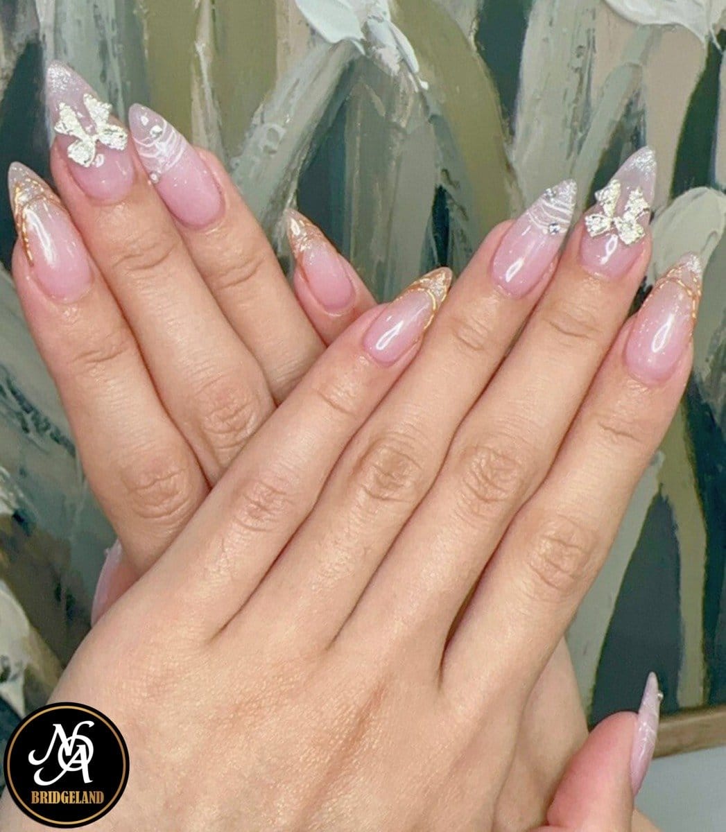 Pastel ombre nails with floral accents